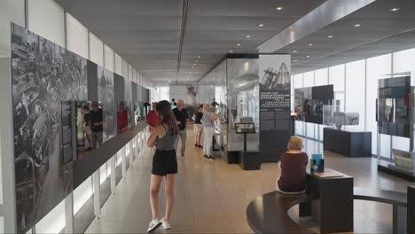 Wide-shot-of-large-hall-with-people-at-Zeppelin-museum-in-Friedrichshafen