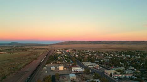 USA-Route-66-And-Railroad-At-Sunset-In-Seligman,-Arizona,-USA