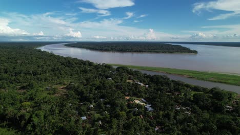 Aerials-shot-of-the-dense-Amazon-forest-and-settlements-in-Colombia