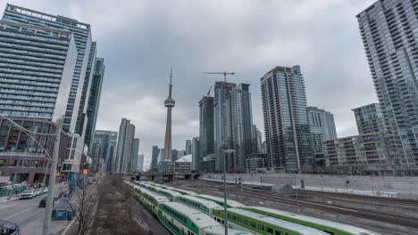 Timelapse-Of-Downtown-Toronto,-Motion-Of-Transportation-And-Clouds