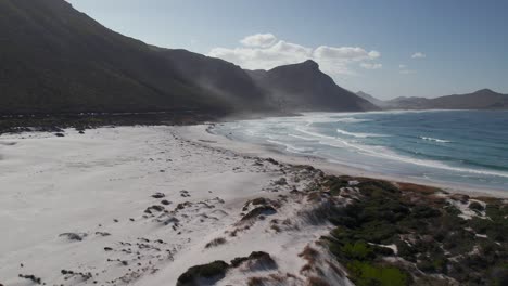 Ocean-And-Sandy-Shore-In-Cape-Town,-South-Africa---Drone-Shot