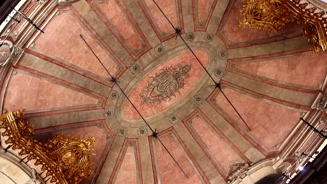 Orbit-shot-of-Igreja-dos-Clerigos-orange-ceiling,-perfect-symmetry