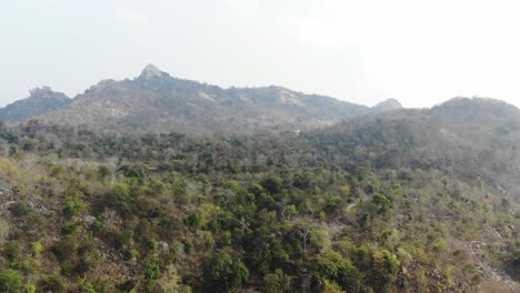 Aerial-shot-of-mountains-and-forest-near-Maa-Kauleshwari-Temple,-Chatra,-Jharkhand,-India