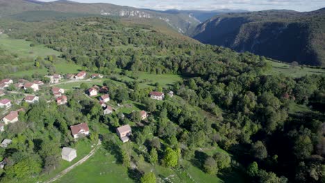 Aerial-of-a-typical-village-in-the-forest-mountains-in-Bosnia