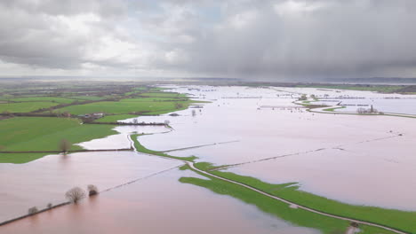 Luftaufnahme-Der-überfluteten-Englischen-Landschaft-Rund-Um-Den-Fluss-Tone,-Somerset