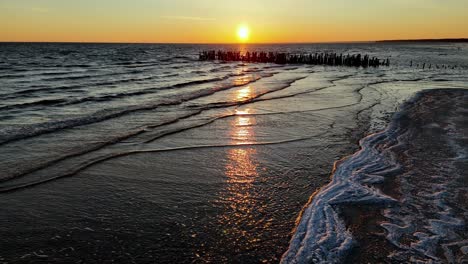 Old-pier-beautiful-sunset-over-a-calm-ocean