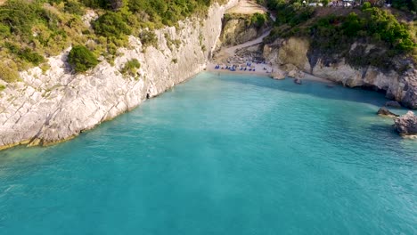 Approaching-drone-shot-of-Xigia,-a-secluded-beach-in-the-island-of-Zakynthos-Island-known-for-its-sulphurous-springs-and-marine-caves-in-Greece