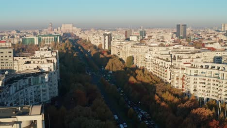 Unirii-boulevard-leading-to-palace-of-parliament,-bucharest,-autumn,-aerial-view