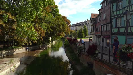 Autumn-Trees-Hangs-Low-Above-Water-Canal-in-Fishmongers-district-in-Colmar