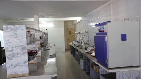 pov-shot-large-lab-showing-many-different-types-of-machines-and-different-types-of-liquids-in-the-lab