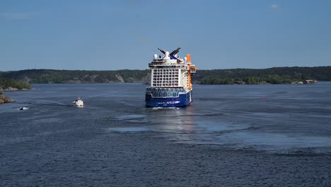 Celebrity-Apex-Cruise-Ship-Sailing-in-Fjord-of-Baltic-Sea-Near-Stockholm,-Sweden