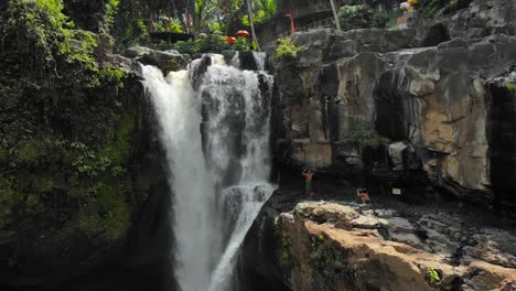 Tegenungan-Waterfall-In-The-Forest-In-Bali,-Indonesia---Drone-orbit-Shot