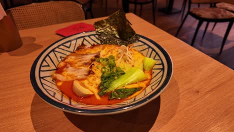 Delicious-freshly-made-miso-ramen-soup-in-bowl-with-seaweed