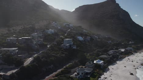 Neighborhood-And-Mountains-In-Misty-Cliffs,-Cape-Town,-South-Africa---Drone-Shot
