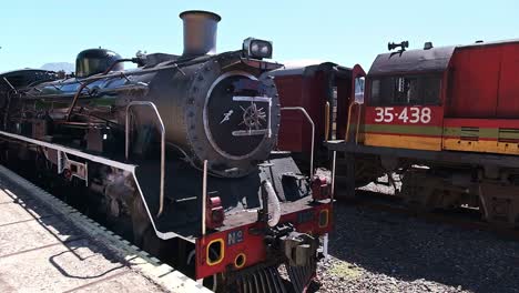 Historic-British-steam-locomotive-engine-parked-up-in-a-station-in-South-Africa
