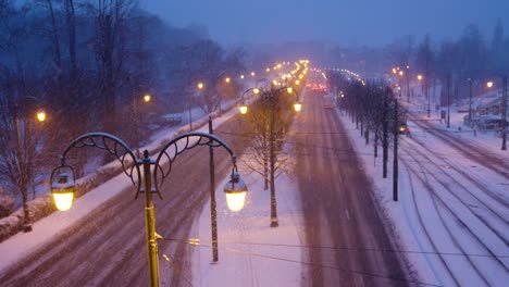 Glowing-Lit-Street-Lamps-On-Snowy-Roads-Of-Brussels,-Belgium