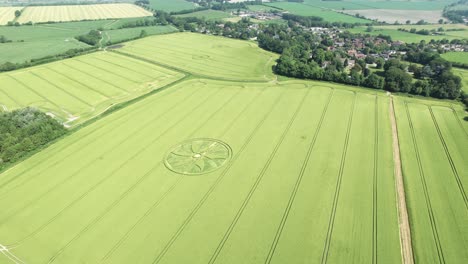 Broad-Hilton-crop-circle-complex-spiral-pattern-aerial-view-circling-high-above-Wiltshire-farming-countryside