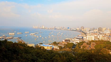 Golden-hour-over-Pattaya-cityscape,-panoramic-view-from-viewpoint,-vibrant-sky