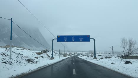 Drivers-view-of-snow-covered-Skardu-city-through-the-highway-in-Pakistan