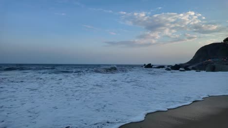 Sandy-beach-of-Koh-Samui-washed-by-the-waves-of-the-sea