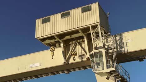 Crane-industrial-on-hydro-plant-sunny-close-up,-Mosonmagyarovar,-Hungary