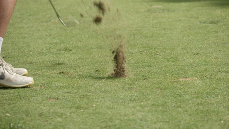 CLOSE-UP-SLOW-MOTOIN-Golfing-Approach-Shot-To-Green-From-Fairway