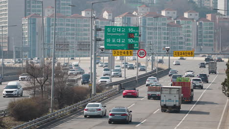 Seoul,-South-Korea-traffic-driving-under-80-km-per-hour-speed-camera,-slow-motion