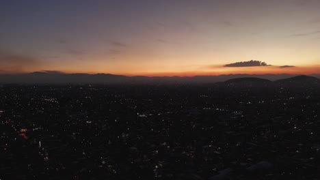 Sunset-splendor-in-Ecatepec,-nightfall-envelops-Metropolitan-landscape-of-CDMX