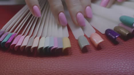 Girl-choosing-colours-for-her-nails