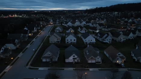 Aerial-truck-shot-of-dark-neighborhood-at-night