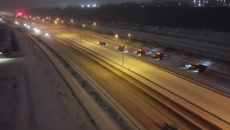 Convoy-of-Snow-Plows-Clearing-Montreal-Highways-After-Blizzard