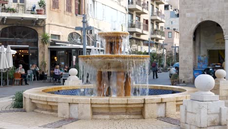 Water-Fountain-With-Casino-San-Remo-In-The-Background-In-Tel-Aviv-Yafo,-Israel