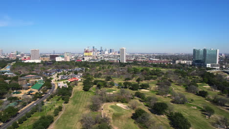 Aerial-View-of-Hermann-Park-and-Houston-Texas-Skyline,-Drone-Shot