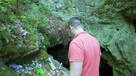 Tourist-looking-around-the-shrine-of-the-tomb-of-the-Egyptian-goddess-Bastet,-located-in-Strandzha-mountain-in-Bulgaria