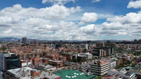 Forward-aerial-shot-of-cityscape-during-clear-day