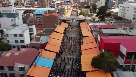 Colorful-parade-of-happy-dancers-during-Carnival-in-Oruro,-Bolivia