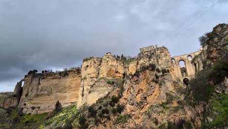 Cinematic-View-Over-Puente-Nuevo-With-Fast-Moving-Clouds,-Ronda,-Spain