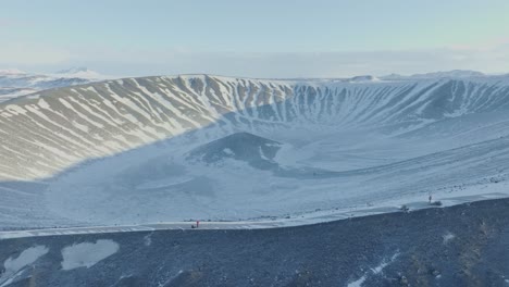 Horizontal-aerial-shot-of-Hverfjall-volcano-and-crater-in-Iceland,-region-of-Mývatn