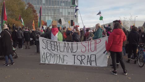 People-with-their-banner-and-flags-at-a-Pro-Palestine-protest-in-Glasgow