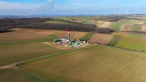 Offshore-Oil-Well-Construction-Site-Surrounded-By-Rural-Fields