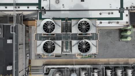 Rotating-propeller-of-Air-Conditioner-on-roof-of-Factory-Building