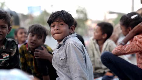 Cinematic-Shot-children-of-slum-area-are-having-fun-and-also-doing-full-smile-looking-in-front-of-the-camera