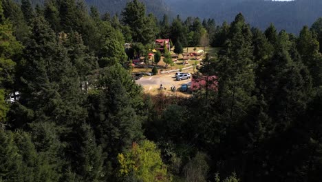 Aerial-view-spot-with-cabin-inside-the-forest-tourism-la-Marquesa-Mexico
