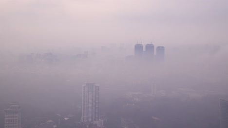 foggy-view-of-mysterious-skyline-and-hills-in-Kuala-Lumpur,-Malaysia