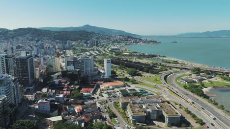 The-downtown-area-and-Beira-Mar-Avenue-of-Florianópolis-Island,-offering-a-vibrant-urban-scene-with-stunning-waterfront-views