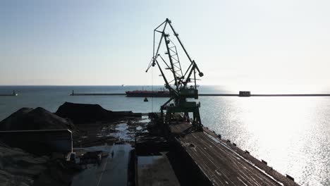 two-large-cranes-in-a-container-ship-port,-harbor,-drone