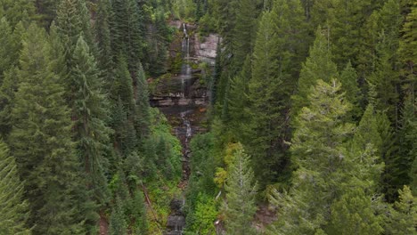 Waterfall,-water-falling-down-rocky-mountain-in-forest