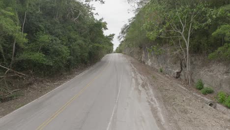 Old-road-connecting-La-Romana-to-Higuey,-Dominican-Republic