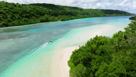Boat-Cruising-In-The-Turquoise-Clear-Water-In-Moso-Island,-Vanuatu