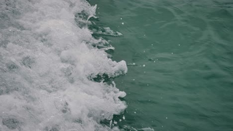 Close-view-of-boat-wake-along-the-Tweed-River,-Northern-New-South-Wales,-Australia